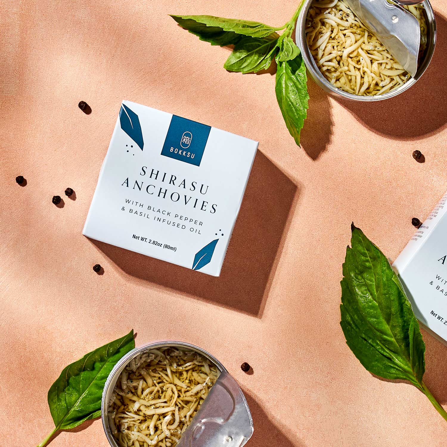 Bokksu Tinned Shirasu Anchovies with Black Pepper and Basil-Infused Oil (4-Pack) - Image 3